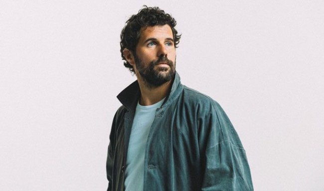 Image Source: https://images.discovery-prod.axs.com/2025/03/nick-mulvey-tickets_12-01-25_17_67eaf098cd525.jpg